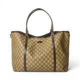 Designer handbag with a distinctive pattern on a white background