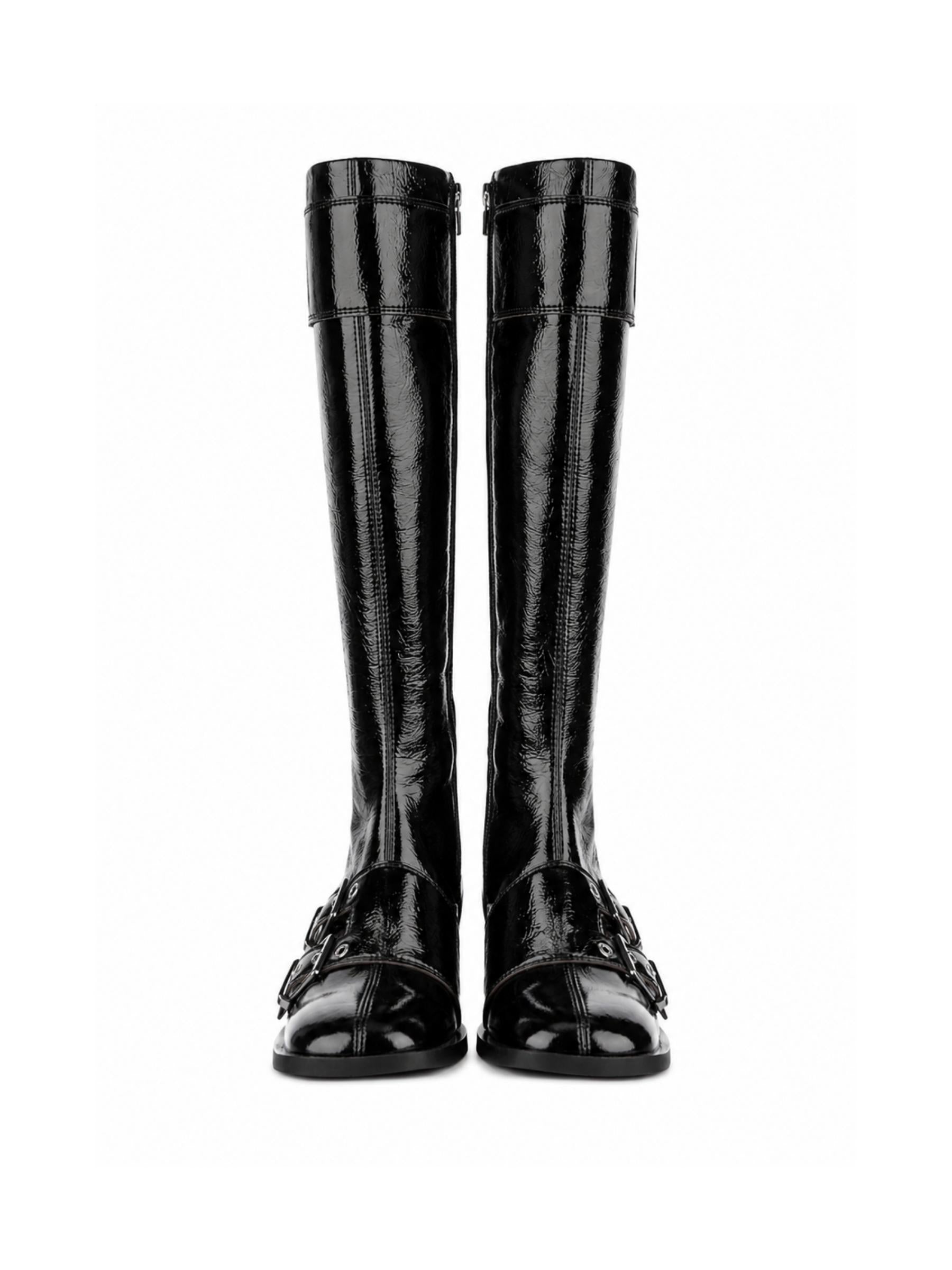 Pair of black knee-high boots on a white background