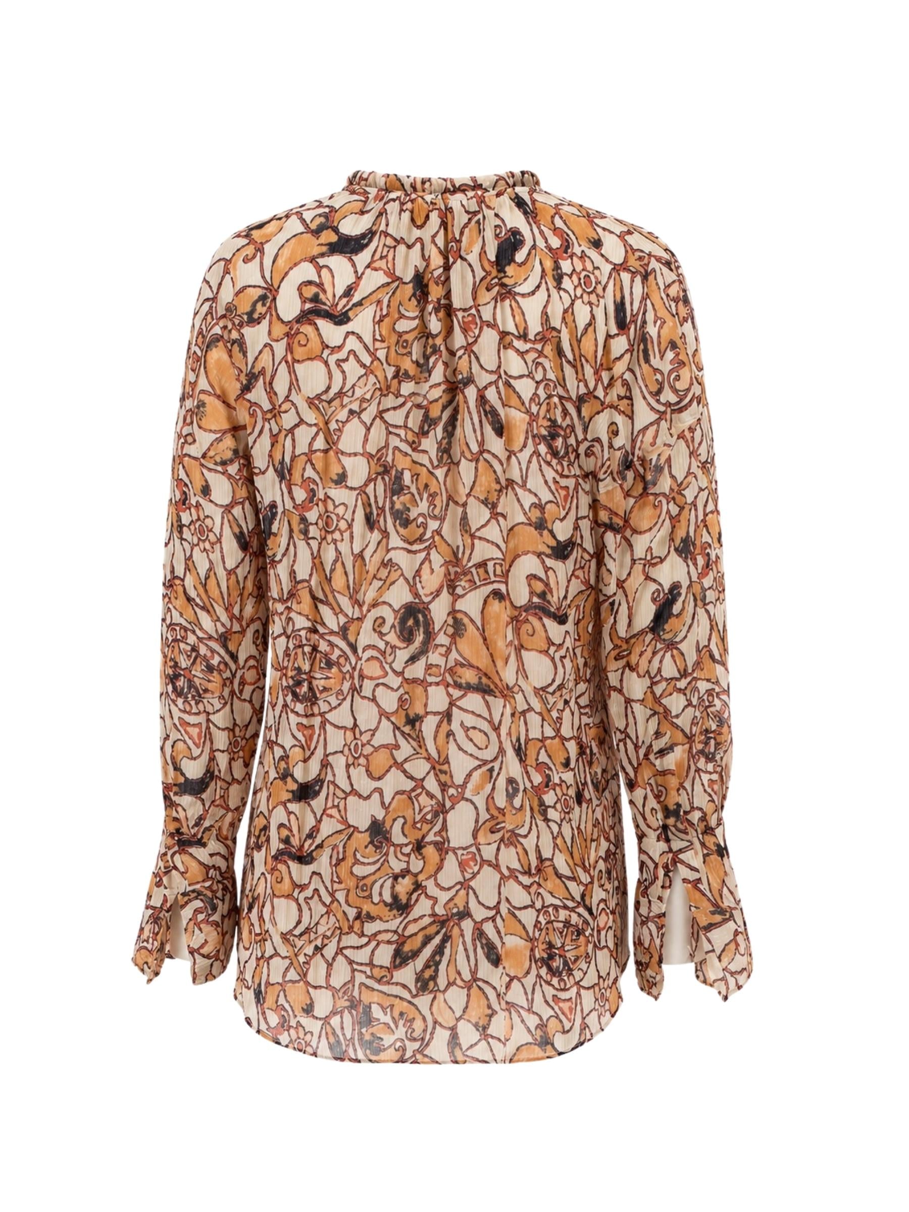 Floral patterned blouse on a white background